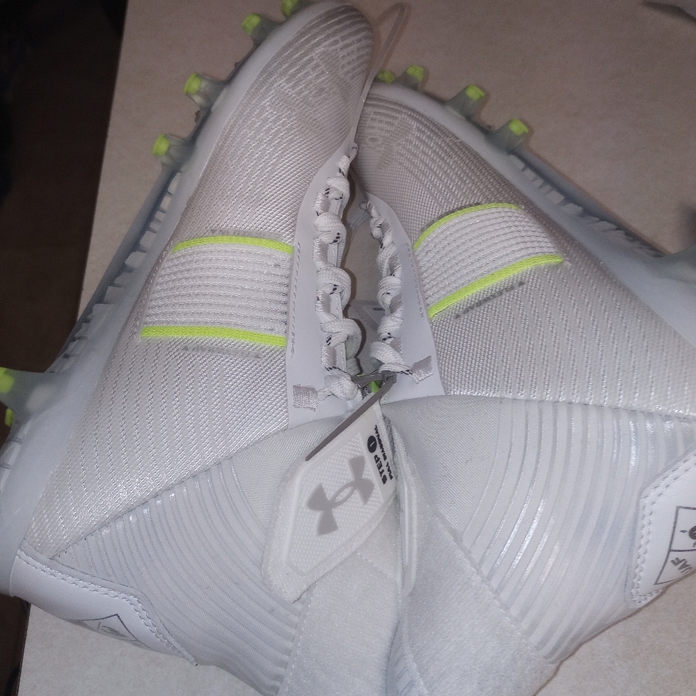 Under Armour cleats.
